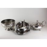 A silver plated pedestal bowl with demi-fluted decoration, 21cm, a circular teapot, oval serving