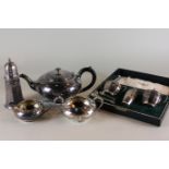 A three-piece plated tea set of teapot, sugar bowl and cream jug, together with a three-piece