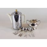 A set of twelve Garrard plated teaspoons, a plated sugar bowl and tongs and a coffee pot