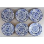 A set of six 19th century Chinese blue and white porcelain plates hand painted with flowers and