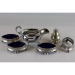 A set of four navette shaped silver plated salt cruets with pierced sides, on ball feet (three