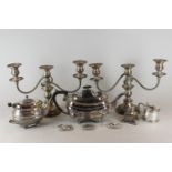 A pair of three light candlesticks with scroll branches, two teapots (a/f), an inkwell, mustard