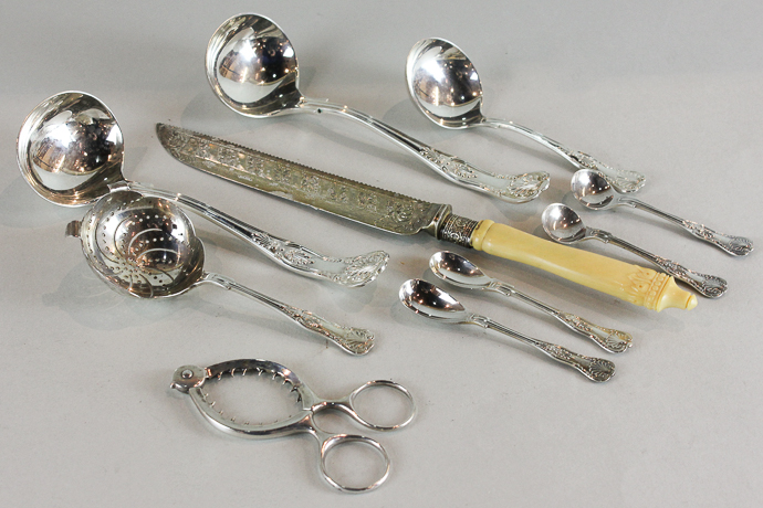 A pair of silver Kings pattern sauce ladles, a pair of mustard spoons and a pair of salt spoons,