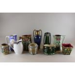 A collection of ten Art Nouveau and later vases, jugs and pots, largest 26cm