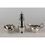A plated baluster shaped sugar caster and a plated cream jug and sugar bowl