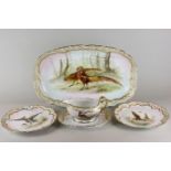 A set of eleven French 19th century porcelain plates, a serving dish and sauce boat with saucer,