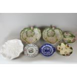 Two Majolica leaf shaped bowls, 31cm, a pair of white glazed leaf shaped plates and four various