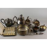 A silver plated three-piece tea set, another teapot, two sugar bowls (a/f), a coaster and a cased