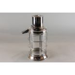 An Asprey silver plated novelty lantern cocktail shaker in the form of a hand held lantern,