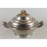 A heavy plated circular tureen with cover, with oriental style decoration, the cover with gilt