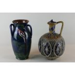 A Doulton Lambeth stoneware jug by Emily E Stoner, and incised Cyprus 1879, decorated in blue and