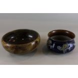 A Royal Doulton stoneware bowl with impressed leaf decoration, 17cm, and another bowl, blue glazed