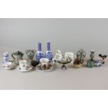 A collection of miniature china items including a pair of Chinese blue and white bottle vases, 10cm,