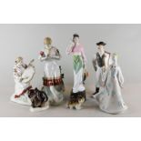 Five various porcelain figure ornaments, a Russian ornament of a bear and another of a bear cub