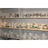 A collection of various teapots, jugs and teacups & saucers in various patterns and colours