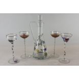 A Nagel coloured glass decanter and stopper, 28cm, a pair of tall stemmed glasses and two others,
