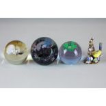 Three Caithness glass paperweights, Wise Owl, Northern Lights, Pop Flower - green, together an