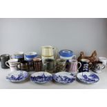 Two Cornishware jugs, a Portmerion chicken shaped dish, eleven pottery mugs, a jug and four Delft