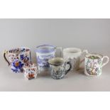 A collection of six 19th century and later porcelain mugs, to include a blue and white 'quart', a
