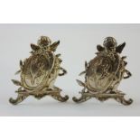 A pair of Dutch late 19th century silver menu holders with import marks for 1898, modelled as a