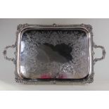 A good Edwardian heavy silver rectangular tray stamped Hancocks and Co 152 New Bond St London,