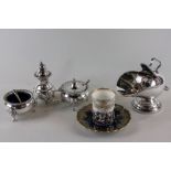 A plated three-piece condiment of salt, pepper and mustard, a sugar bowl with scoop and a silver