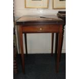 An Edwardian mahogany envelope top card table with one drawer on four square tapered legs, 51cm