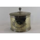 A Henry Wilkinson and Co plated circular biscuit box with engraved decoration and hinged top (