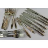 Six electroplated table forks, six dessert forks and six fish knives