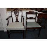 A Regency mahogany framed elbow chair with scroll arms on 'sabre' front legs, together with a