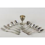 A George IV silver caddy spoon, maker WC London 1823, with flower engraved bowl and fiddle pattern