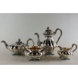 A George IV silver four-piece tea and coffee set, maker Emes and Barnard London 1828, with 'melon'