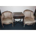 A pair of 19th century French fauteuils with carved show wood moulded frames on cabriole front