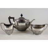 A Victorian three-piece silver tea set, maker Goldsmiths and Silversmiths London and Sheffield 1901,
