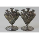 A pair of 19th century continental silver 'triple' bud vases, import marks for 1899, each with