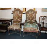 A pair of Victorian copies of William and Mary open armchairs with walnut frames and high backs