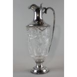 An Edwardian silver mounted and cut glass claret jug, maker Goldsmith and Silversmith Co Ltd, with