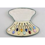 A set of twelve continental silver (925 mark) and enamelled coffee spoons, each a different
