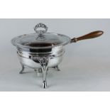 A silver plated chafing dish and cover on stand with spirit burner, with cookbook