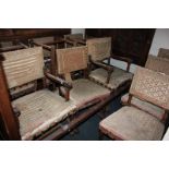 A set of twelve copies of Cromwellian dining chairs with tapestry back and seats and brass suds on