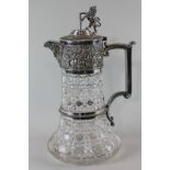 A late 19th, early 20th century Elkington plate mounted cut glass claret jug with lion and shield