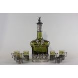 A 19th century continental silver mounted green glass decanter and six glass tumblers in silver