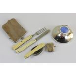 A Mappin and Webb silver and enamelled capstan inkwell, a silver Vesta case and three folding '