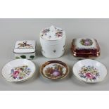 A Minton porcelain box and cover with floral decoration, a Limoges box and cover, a Wedgwood box and