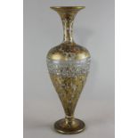 A late 19th century Bohemian tall glass vase with Greek key pattern band and all-over gilt leaf