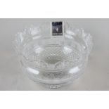 A Waterford crystal glass bowl with shaped top rim and slice and hobnail body, on slight stemmed