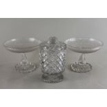 A pair of frosted and cut glass tazza, each with shallow bowl and Greek key pattern on stemmed