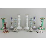 A pair of Delftware candlesticks, 19cm, three other pairs of candlesticks, a single porcelain