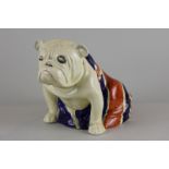 A Royal Doulton figure of a bulldog draped with a Union Jack flag, 22cm