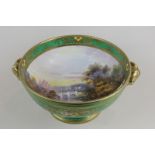 A Japanese Noritake circular porcelain bowl with hand painted interior of river landscape with
